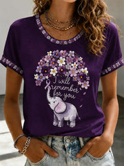 Damen-T-Shirt mit lila Blumenmuster und Aufdruck zur Sensibilisierung für die Alzheimer-Krankheit