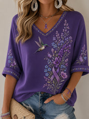 Damen-T-Shirt in Lila mit Blumen- und Kolibri-Print, halblangen Ärmeln und V-Ausschnitt – Unterstützung für das Bewusstsein rund um die Alzheimer-Krankheit