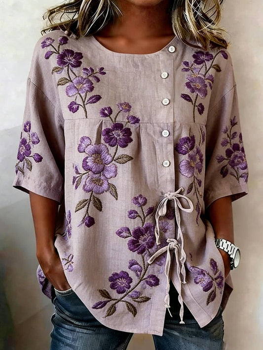 Damenbluse aus Leinenmischgewebe mit Blumenmuster und Knöpfen