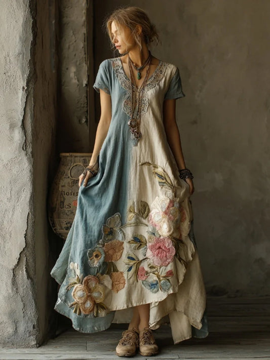 Damenkleid im Retro-Stil mit floraler Farbblock-Optik und kurzen Ärmeln