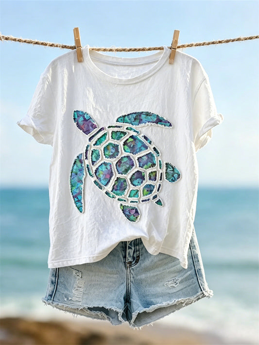 Damen-T-Shirt mit Seeschildkröten-Design in Fransenoptik, Kunstprint, Kurzarm