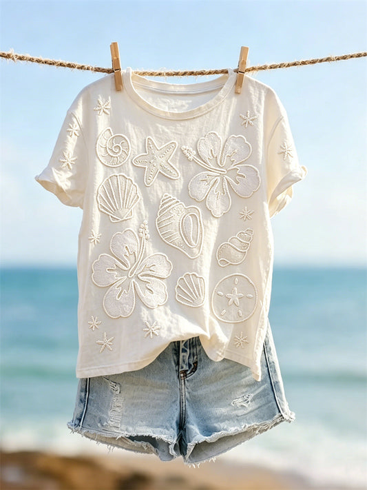 Damen-T-Shirt mit Sternen, Muscheln und Blumenmuster, kurze Ärmel