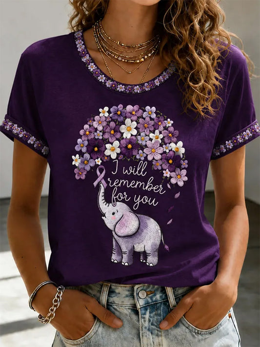 Damen-T-Shirt mit lila Blumenmuster und Aufdruck zur Sensibilisierung für die Alzheimer-Krankheit