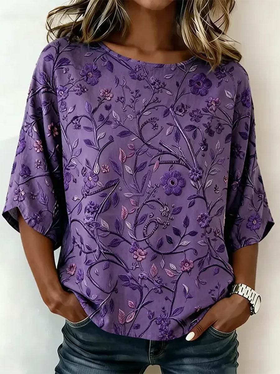 Damen-T-Shirt mit lila Blumenmuster und Aufdruck zur Sensibilisierung für die Alzheimer-Krankheit