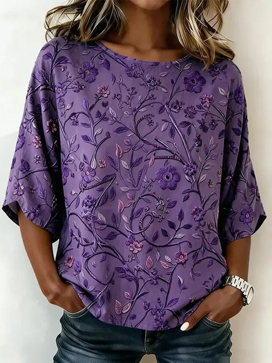 Damen-T-Shirt mit lila Blumenmuster und Aufdruck zur Sensibilisierung für die Alzheimer-Krankheit