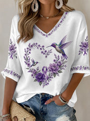 Damen-T-Shirt in Lila mit Blumen- und Kolibri-Print, halblangen Ärmeln und V-Ausschnitt – Unterstützung für das Bewusstsein rund um die Alzheimer-Krankheit