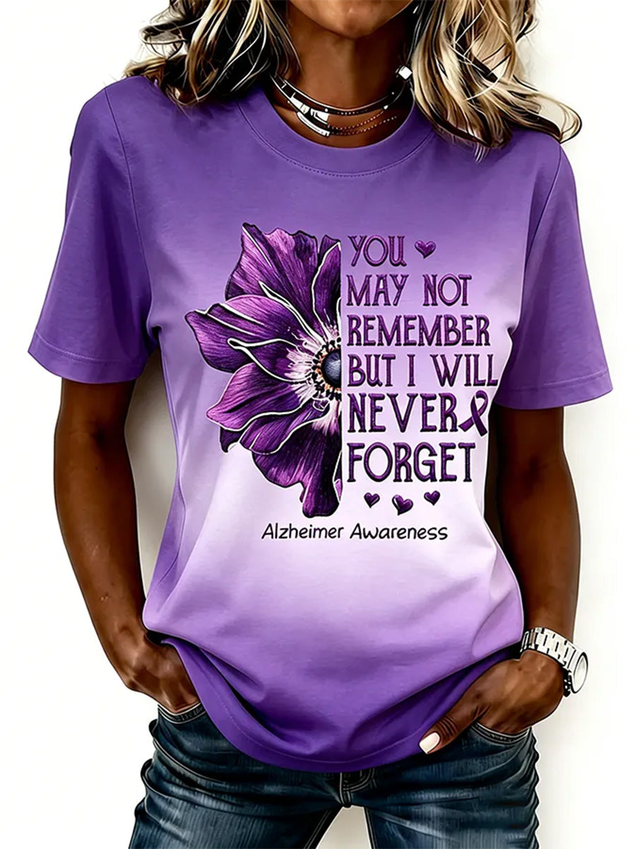 Damen-T-Shirt mit lila Blumenmuster und Aufdruck zur Sensibilisierung für die Alzheimer-Krankheit