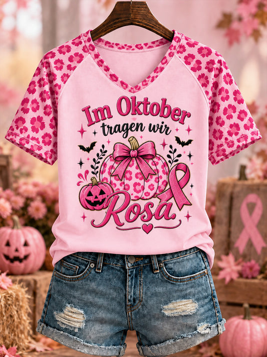 Damen-T-Shirt mit Aufdruck „Im Oktober tragen wir ROSA.“ und V-Ausschnitt