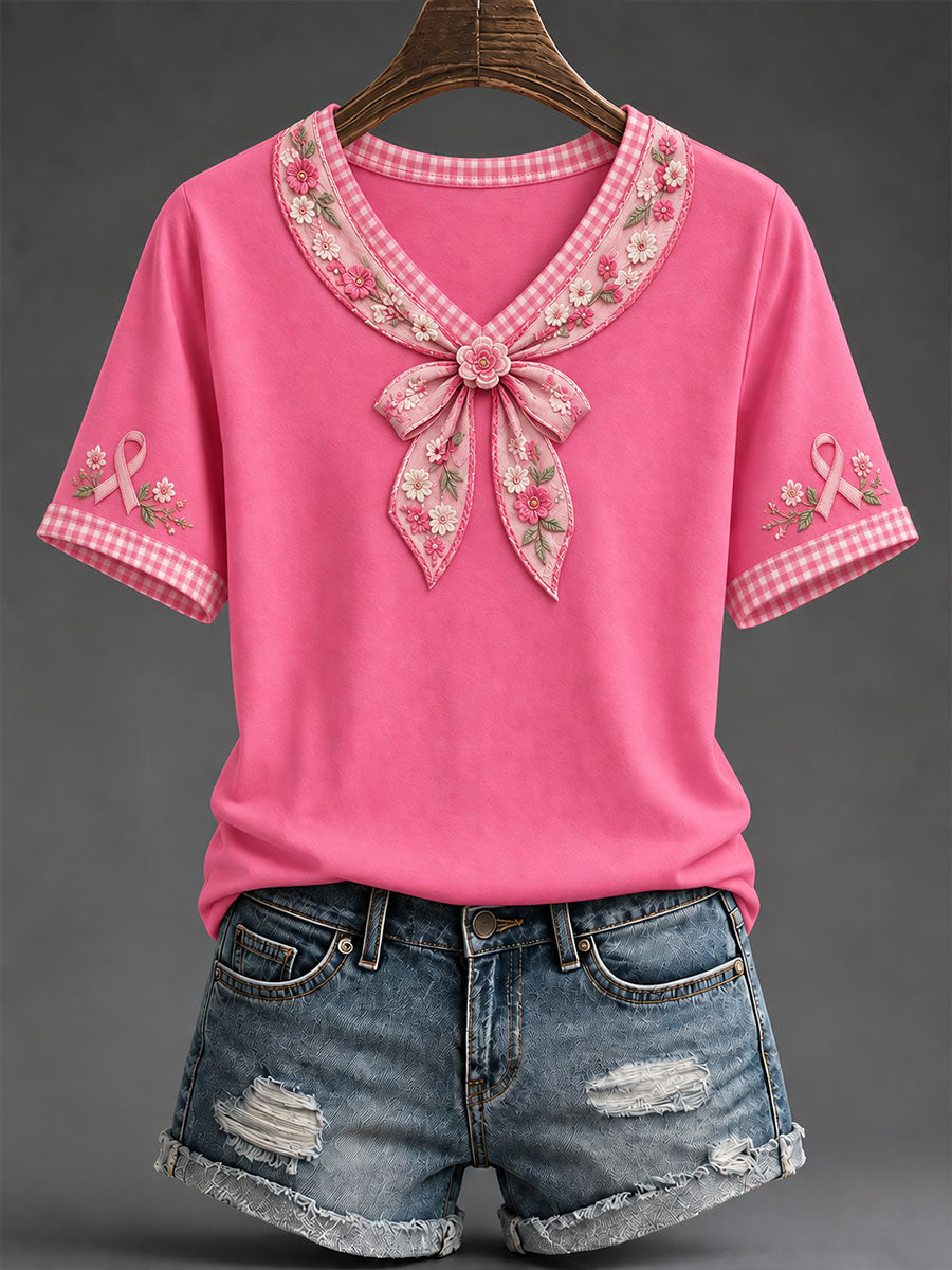 Damen-T-Shirt mit rosa Schleife und floralem Kunstprint